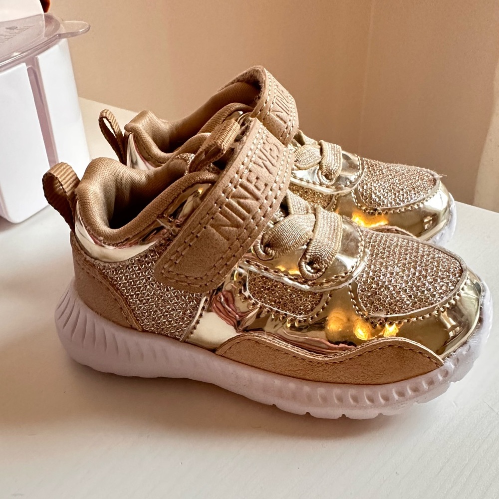 Michael Kors gold sneakers
